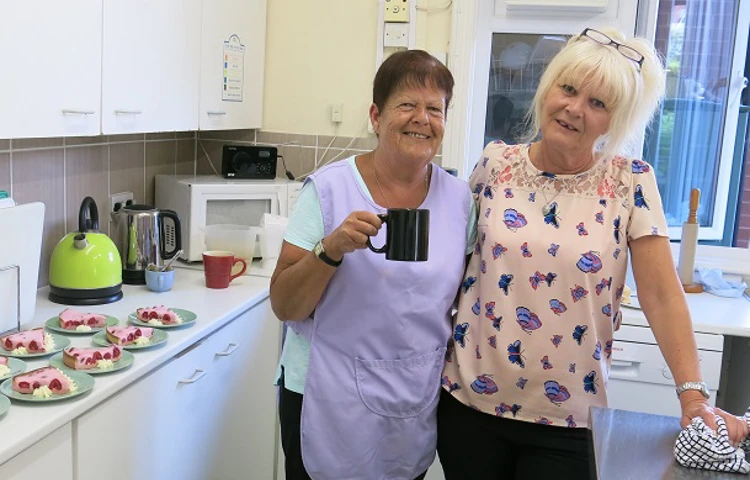 Shirley and Pauline enjoying a tea in the kitchen