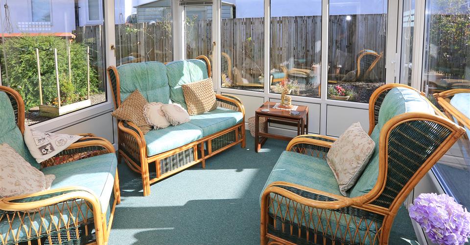 The sunny conservatory at  Abbeyfield House, Barnoldswick BB18 5JX