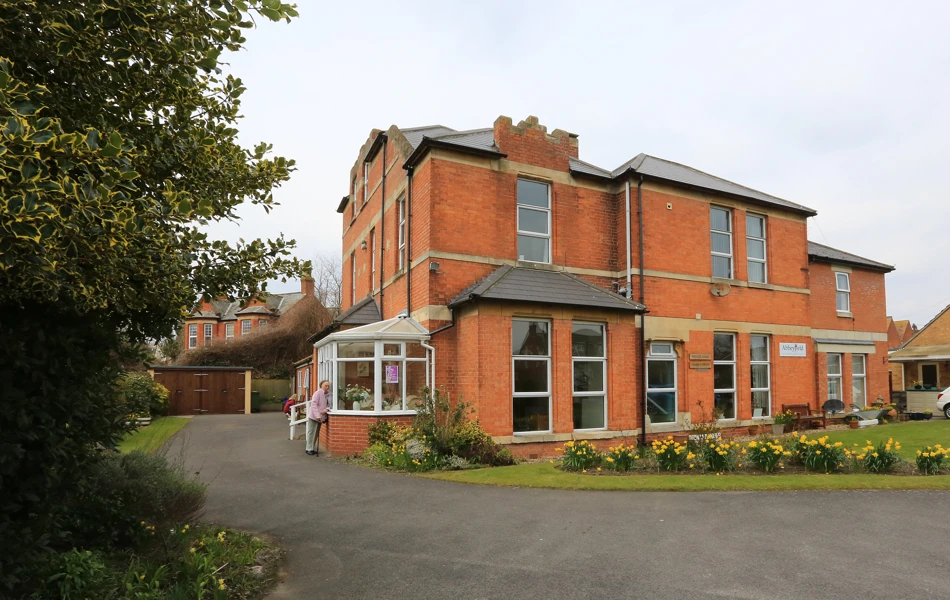 .Spring flowers in the garden of Abbeyfield Woodlands, Burnham-on-Sea TA8 2EX