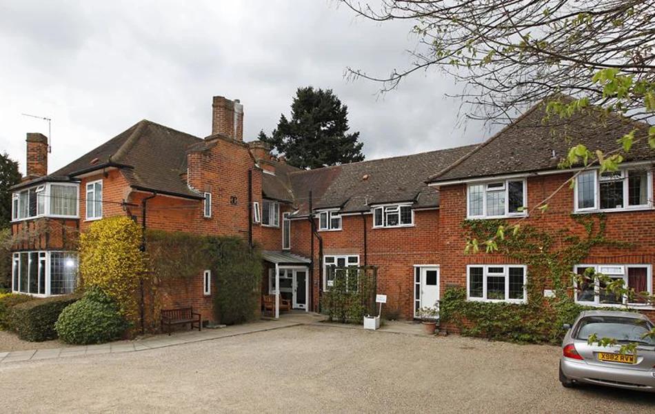 Front exterior and car park at Abbeyfield, Austenmead