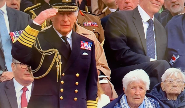 A Royal Encounter: Veteran Joy Trew Sits Beside King at VE Day Parade