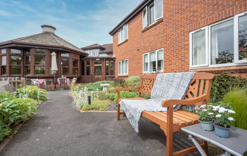 Holloway House Bench And Flower Beds