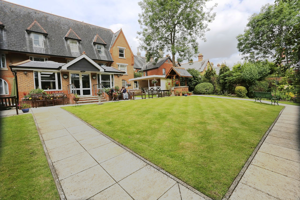 Back exterior of Abbeyfield House, Reading showing a beautiful garden for residents to enjoy