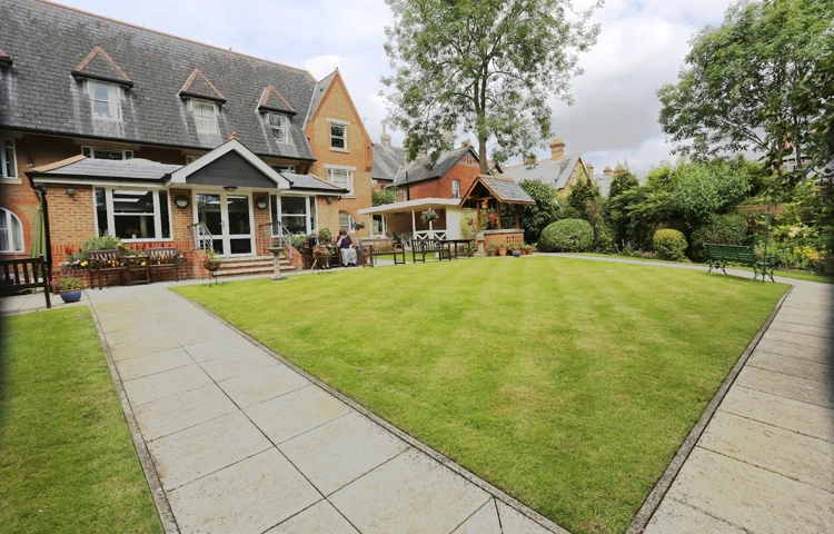 Back exterior of Abbeyfield House, Reading showing a beautiful garden for residents to enjoy