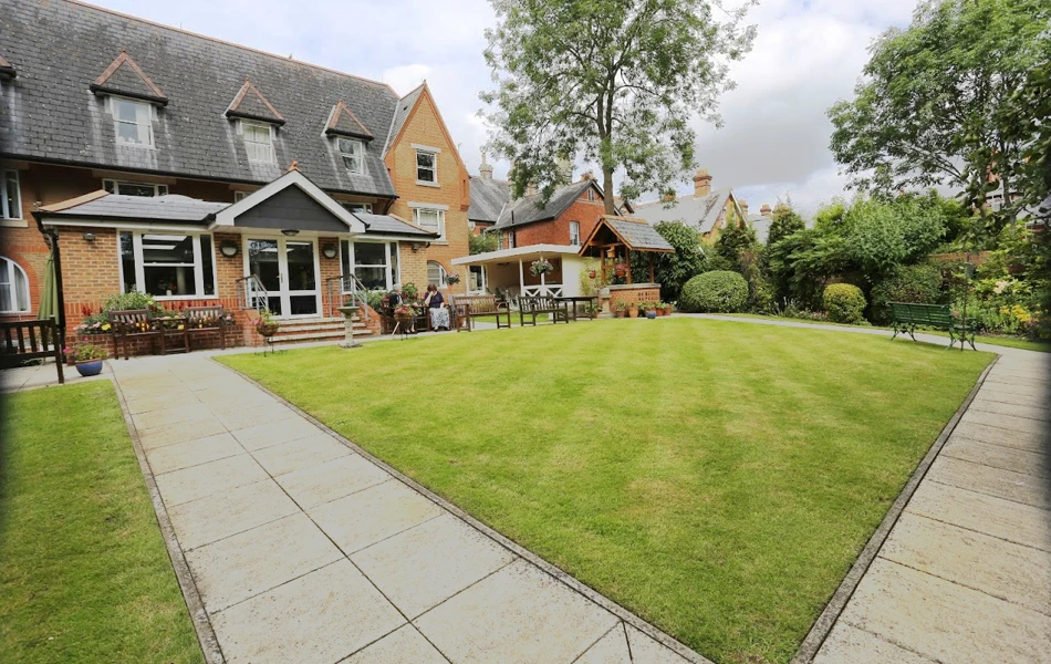 Back exterior of Abbeyfield House, Reading showing a beautiful garden for residents to enjoy