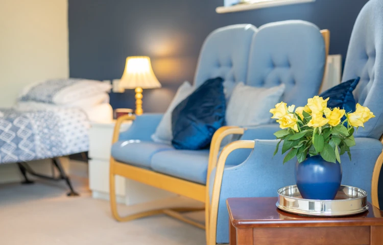Bedroom With Lounge Area At Carnarvon House
