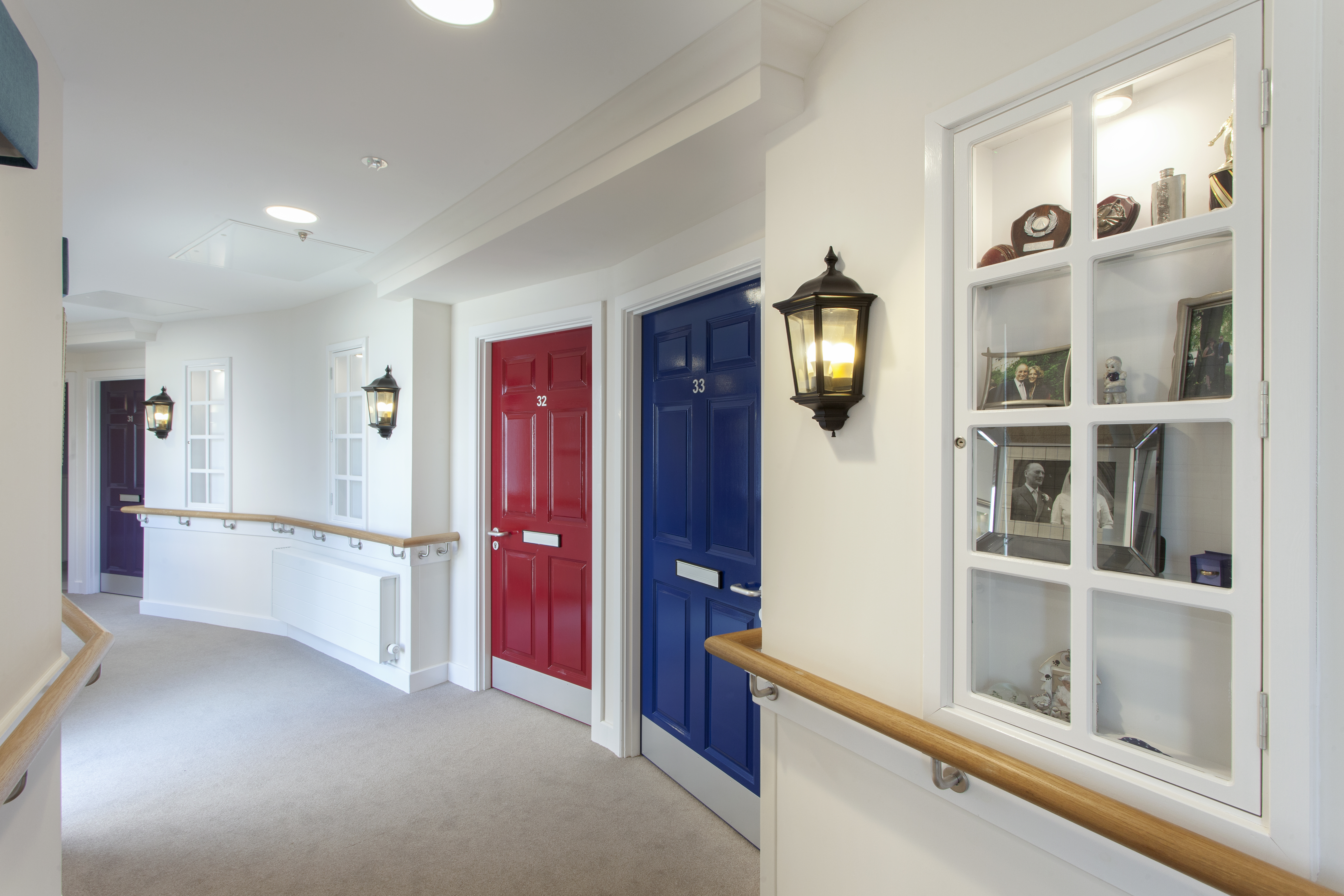 Each bedroom has a brightly coloured door complete with letterbox and street lamp