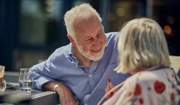 Smiling Older Man Laughing With Older Woman