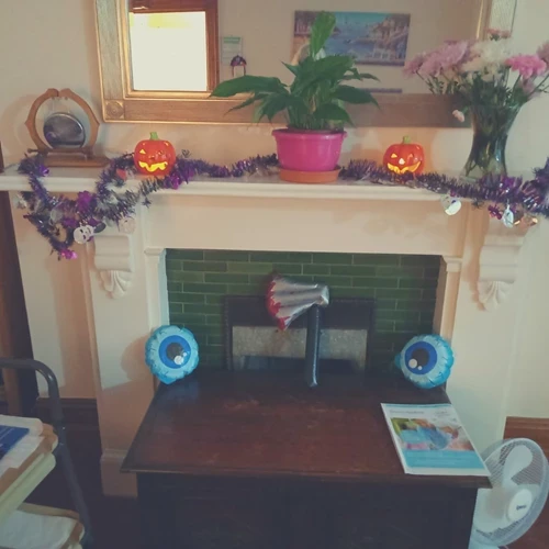 Fireplace dressed up with halloween decorations