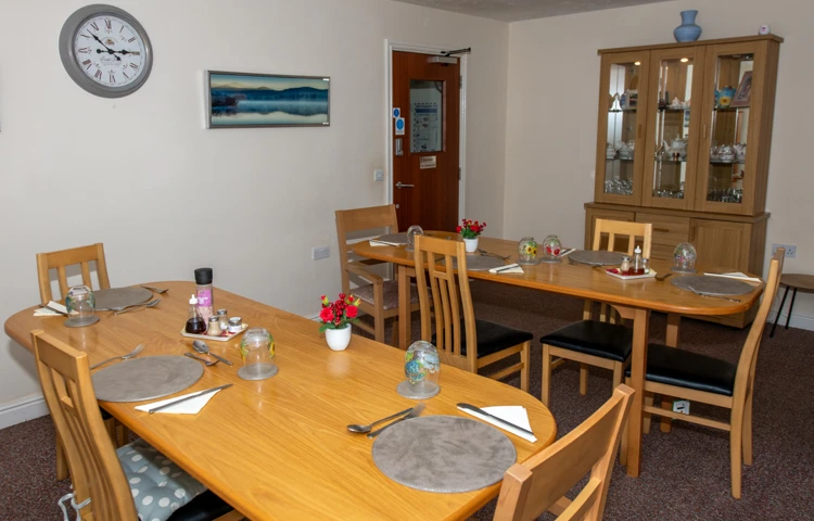 Communal dining room at Abbeyfield House, Flint CH6 5AS