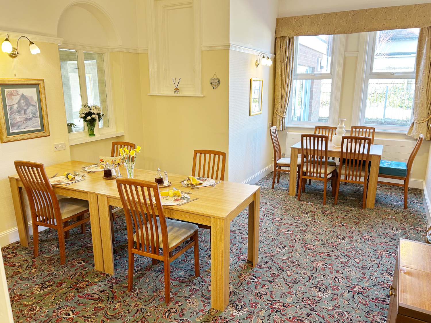 Dining Room At Abbeyfield West Wight With Set Tables