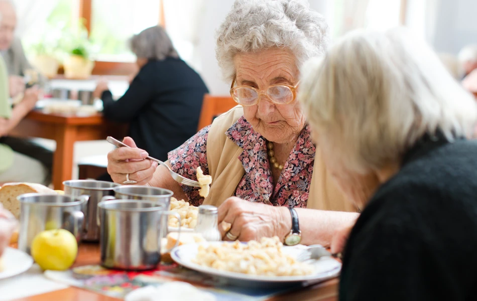 Residents sat eating together
