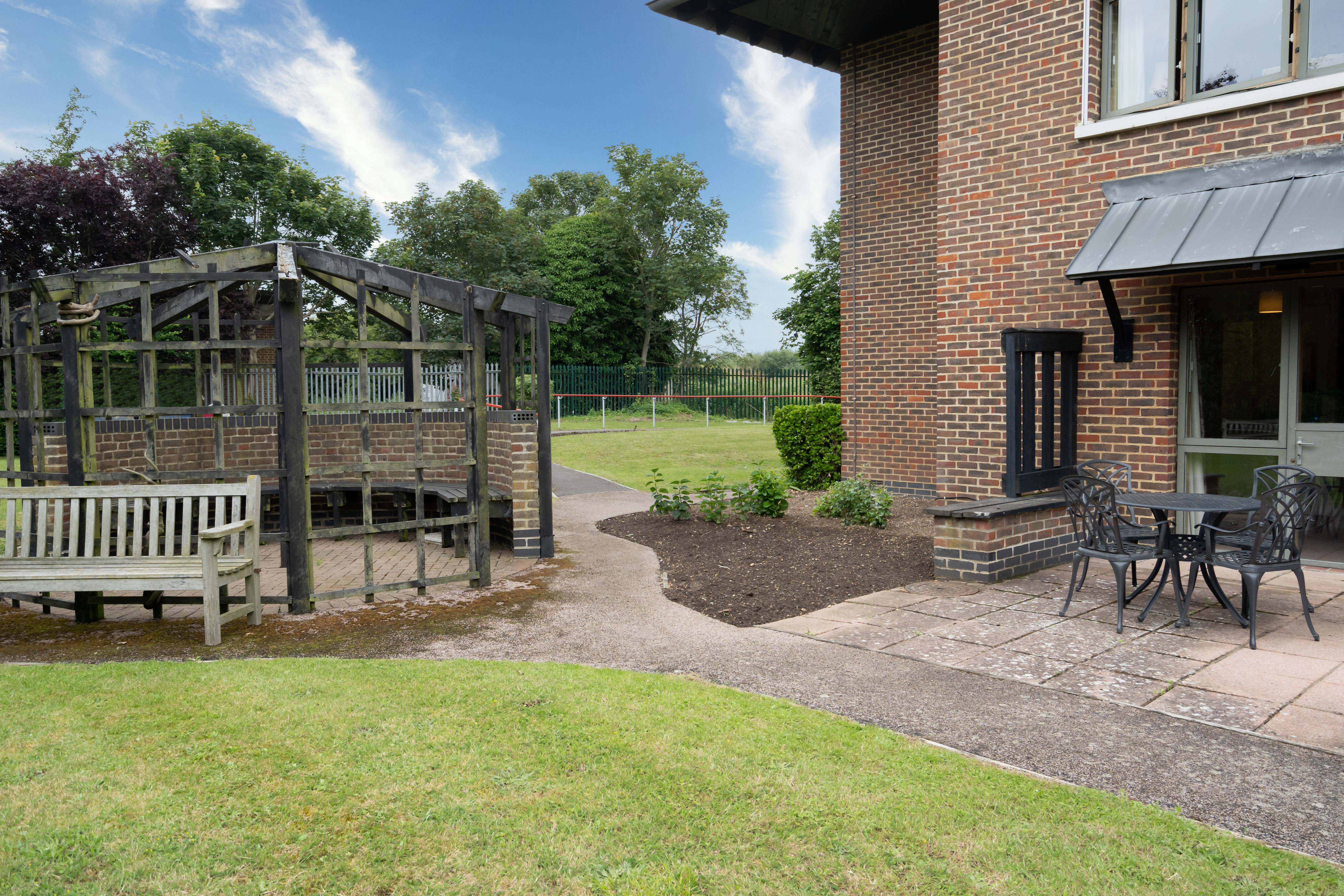View from the garden and seating area at Abbeyfield House, New Malden Garden