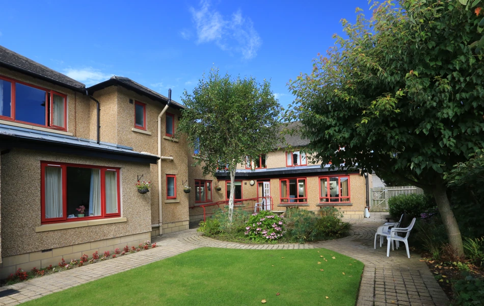 Chirnside House gardens with flower beds and seating