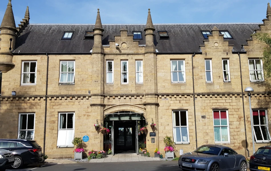 Outside entrance way to Grove House with its grand turrets