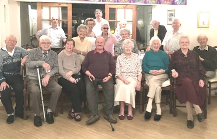 Several residents posing for a photo