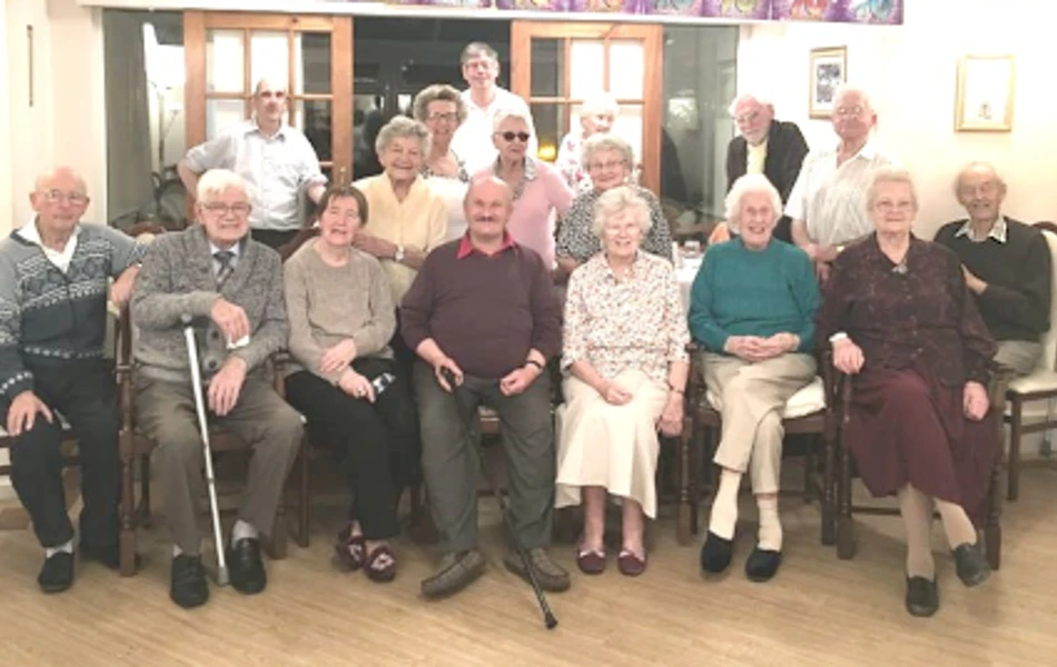 Several residents posing for a photo