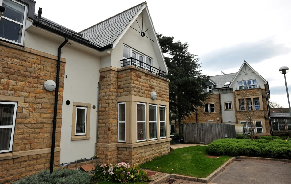 A view of a rooms with balcony and garden area at Abbeyfield The Beeches , Ilkley