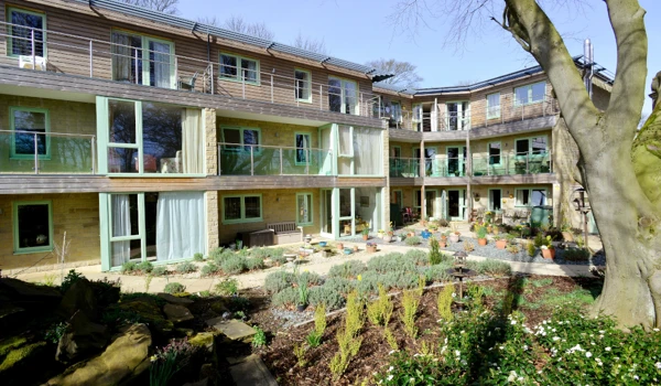 The rear of the house with glass balconies
