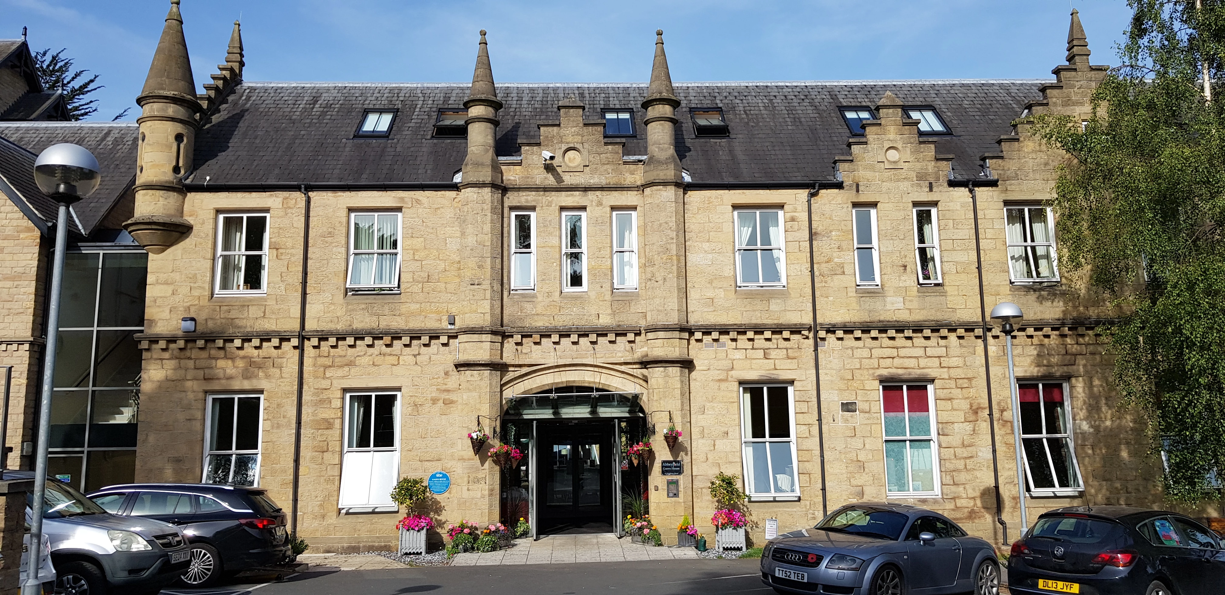 Outside Entrance Way To Grove House With Its Grand Turrets