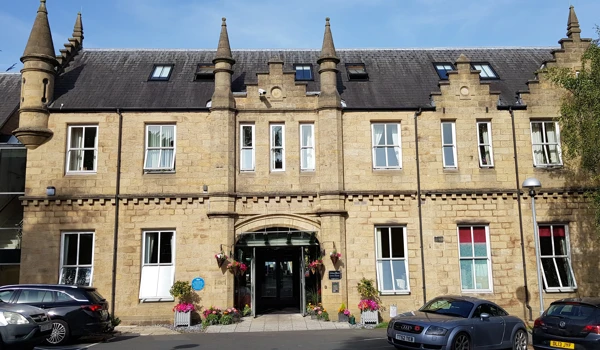 Outside Entrance Way To Grove House With Its Grand Turrets