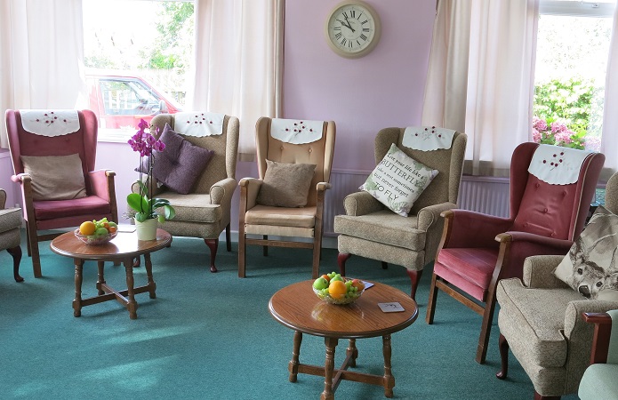 Residents lounge with lots of chairs to enjoy meeting people.