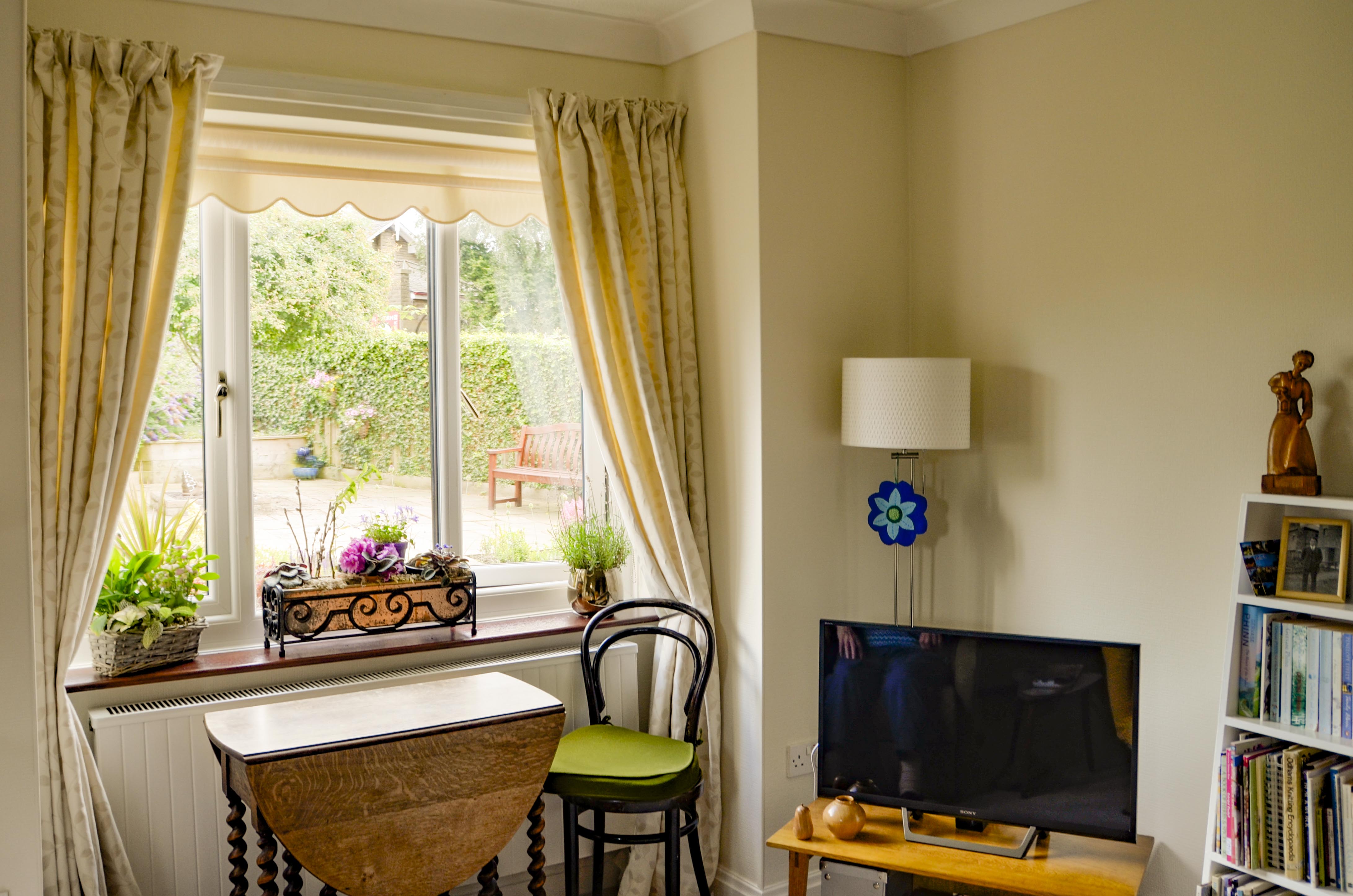 Room with side table and TV at Castle View House, BB7 2DT