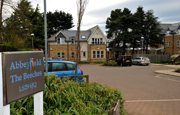 A large car park at the front of The Beeches independent Living in Menston, Ilkley, West Yorks