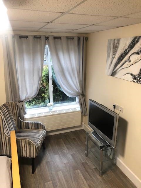Resident Bedroom Armchair Television