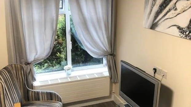Resident Bedroom Armchair Television