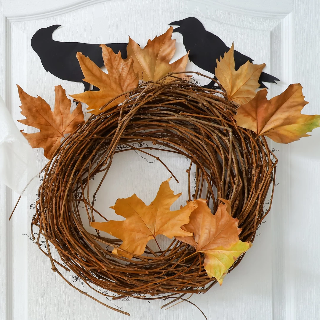 Halloween Wreath With Leaves And Cutout Bird