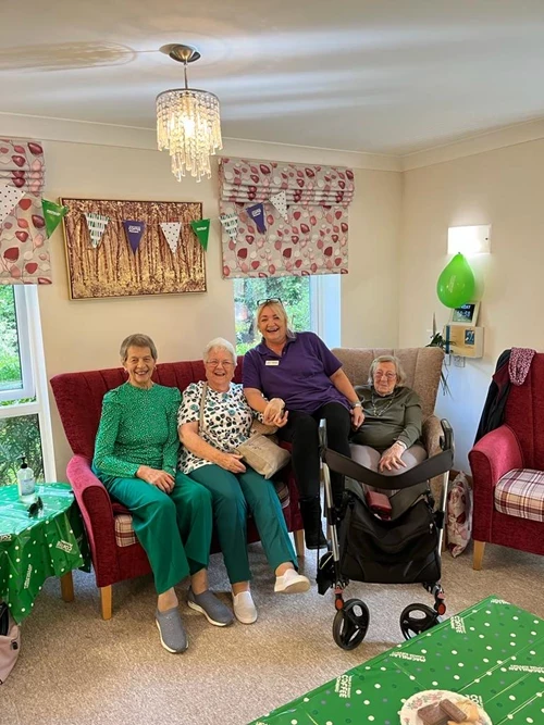 The joy of careers and Volunteering at Abbeyfield Wessex - residents enjoying fun activities in the communal area