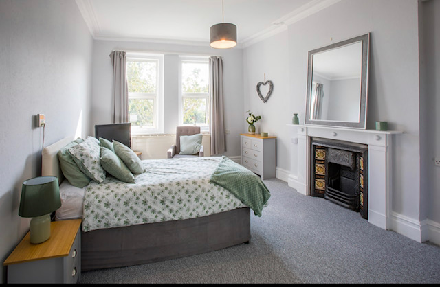 lovely-bright-bedroom-with-fireplace at Abbeyfield House, Bristol BS9 3AU