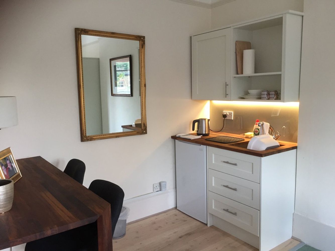 Modern kitchenette area in resident room at Abbeyfield House, Dulwich