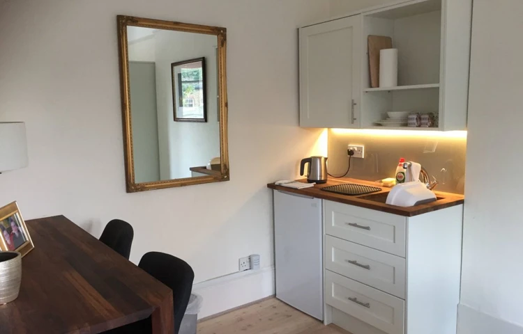 Modern kitchenette area in resident room at Abbeyfield House, Dulwich