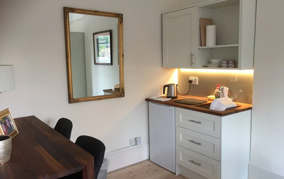 Modern kitchenette area in resident room at Abbeyfield House, Dulwich