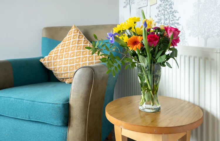 Lounge With Fresh Flowers At Bradbury House