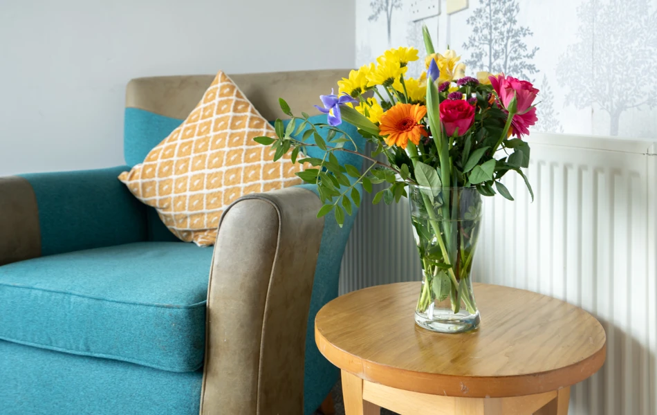 Lounge With Fresh Flowers At Bradbury House