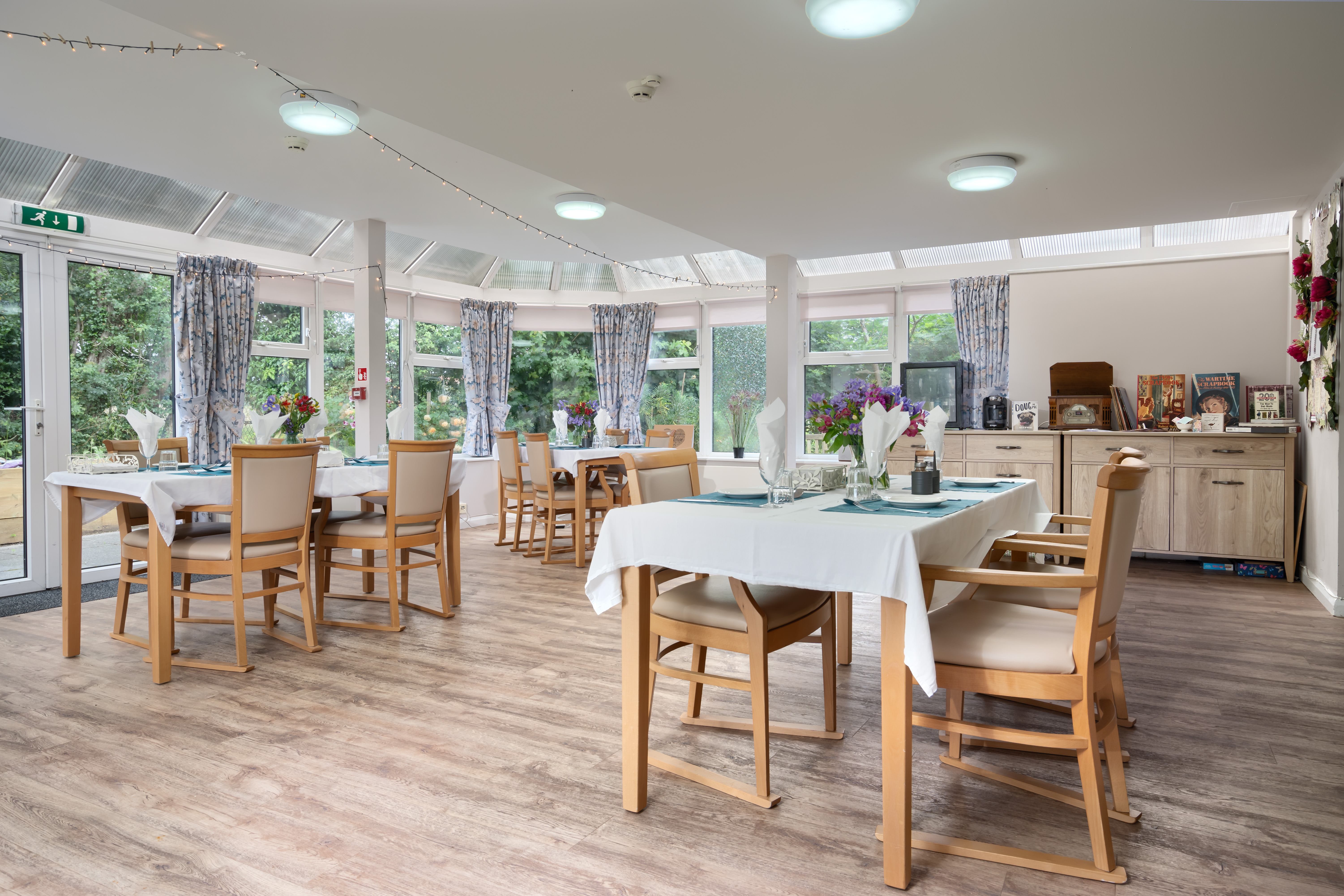 Pratt House communal dining room with table and chairs