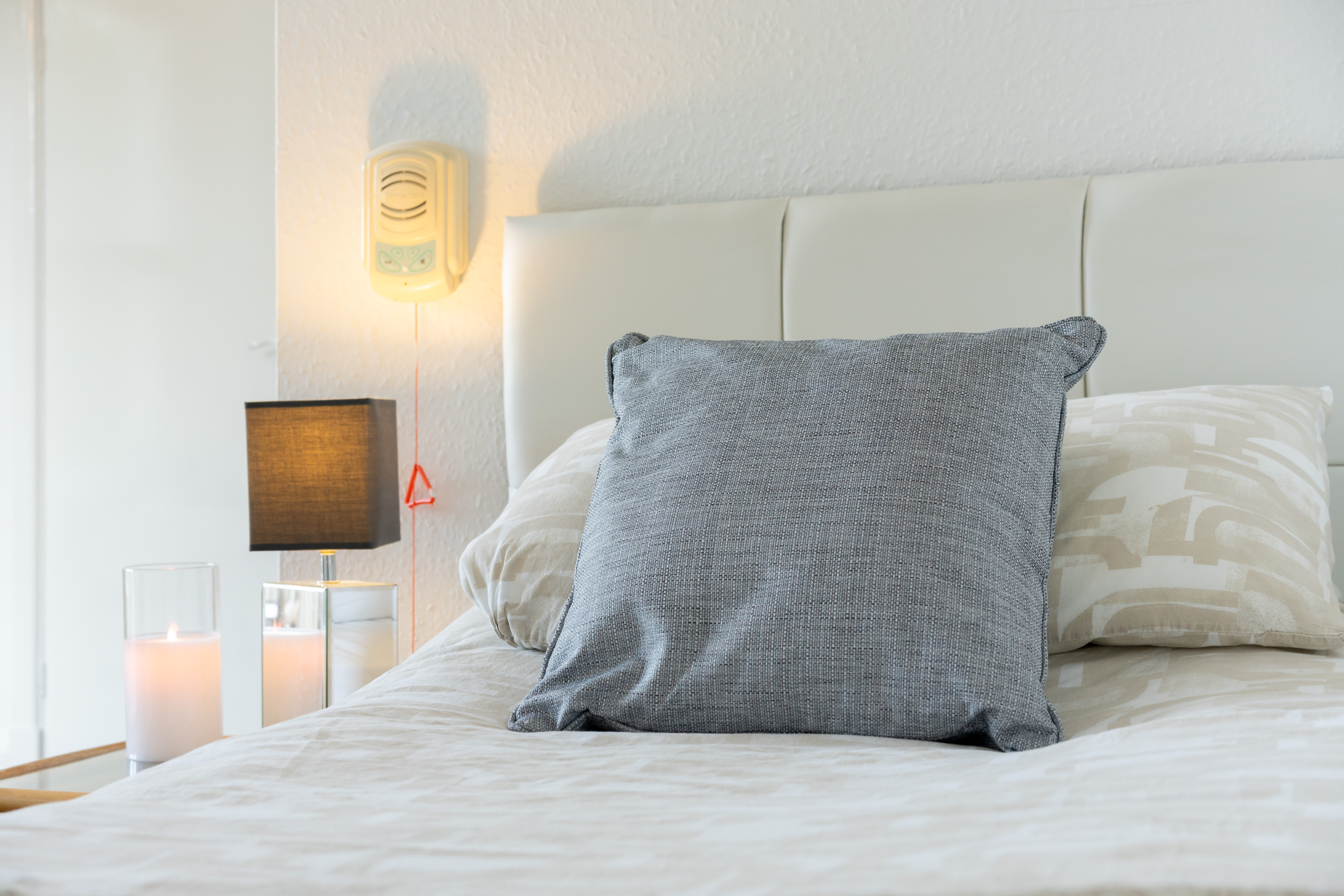 Single Bed With Cushion At Abbeyfield House