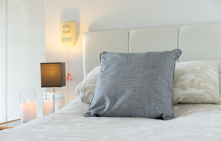 Single Bed With Cushion At Abbeyfield House