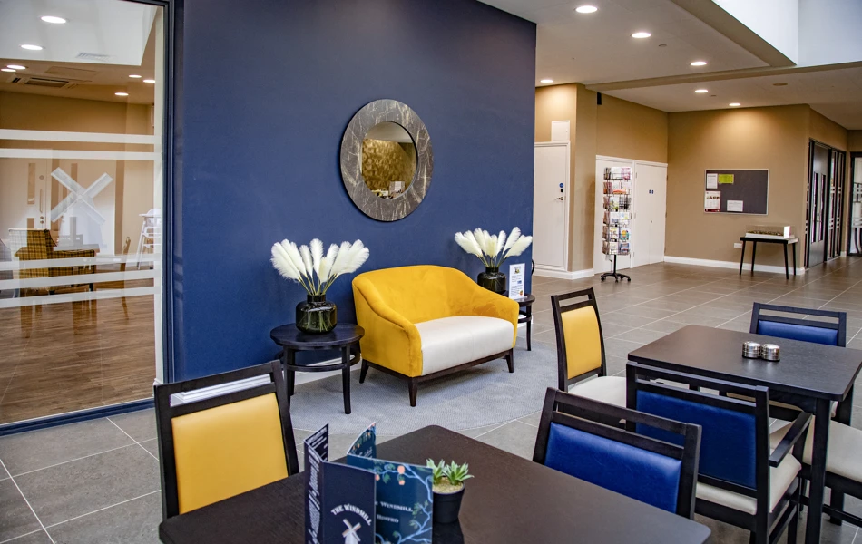 Communal seating area at Polly's Field Village, Braintree CM7 5XD