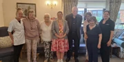 Carrot cake and community make Mayor’s visit ‘a delight’