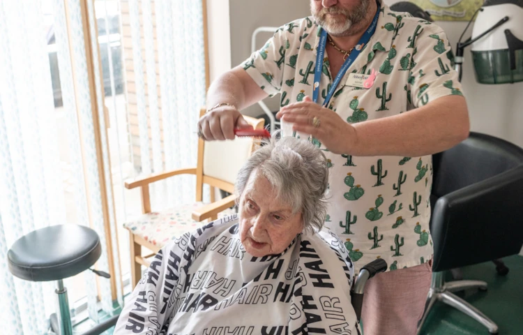 Resident Having A Hair Cut At Winton House