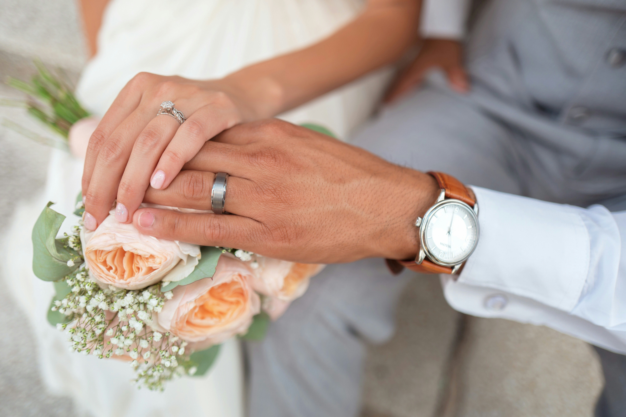 Close Up Of Hands Of Couple Getting Married