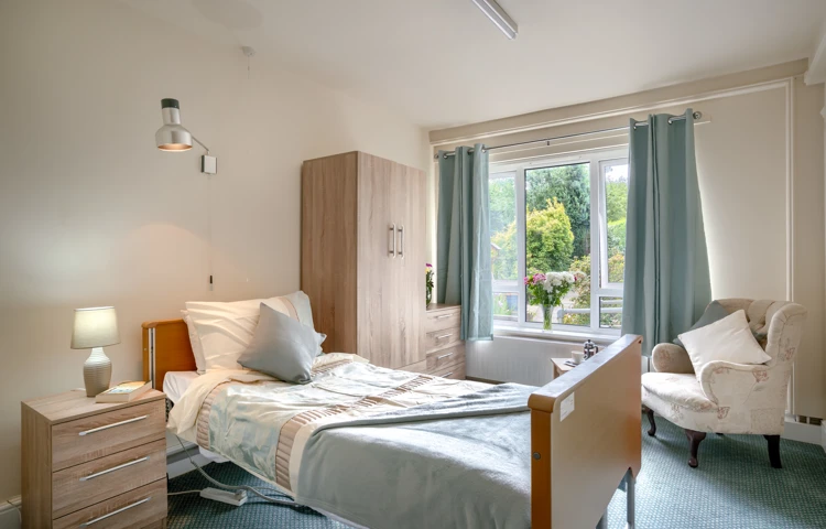 Resident bedroom at Abbeyfield House Bramhall, Manchester