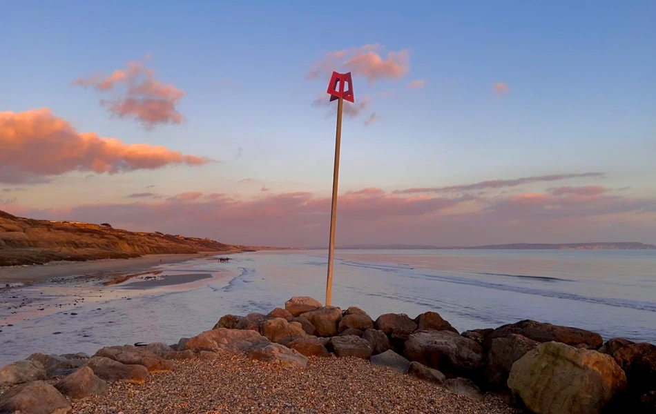 Sun setting on Highcliffe Beach