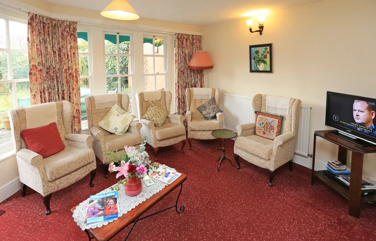 TV lounge at Ainslie House, Hereford HR1 2NB