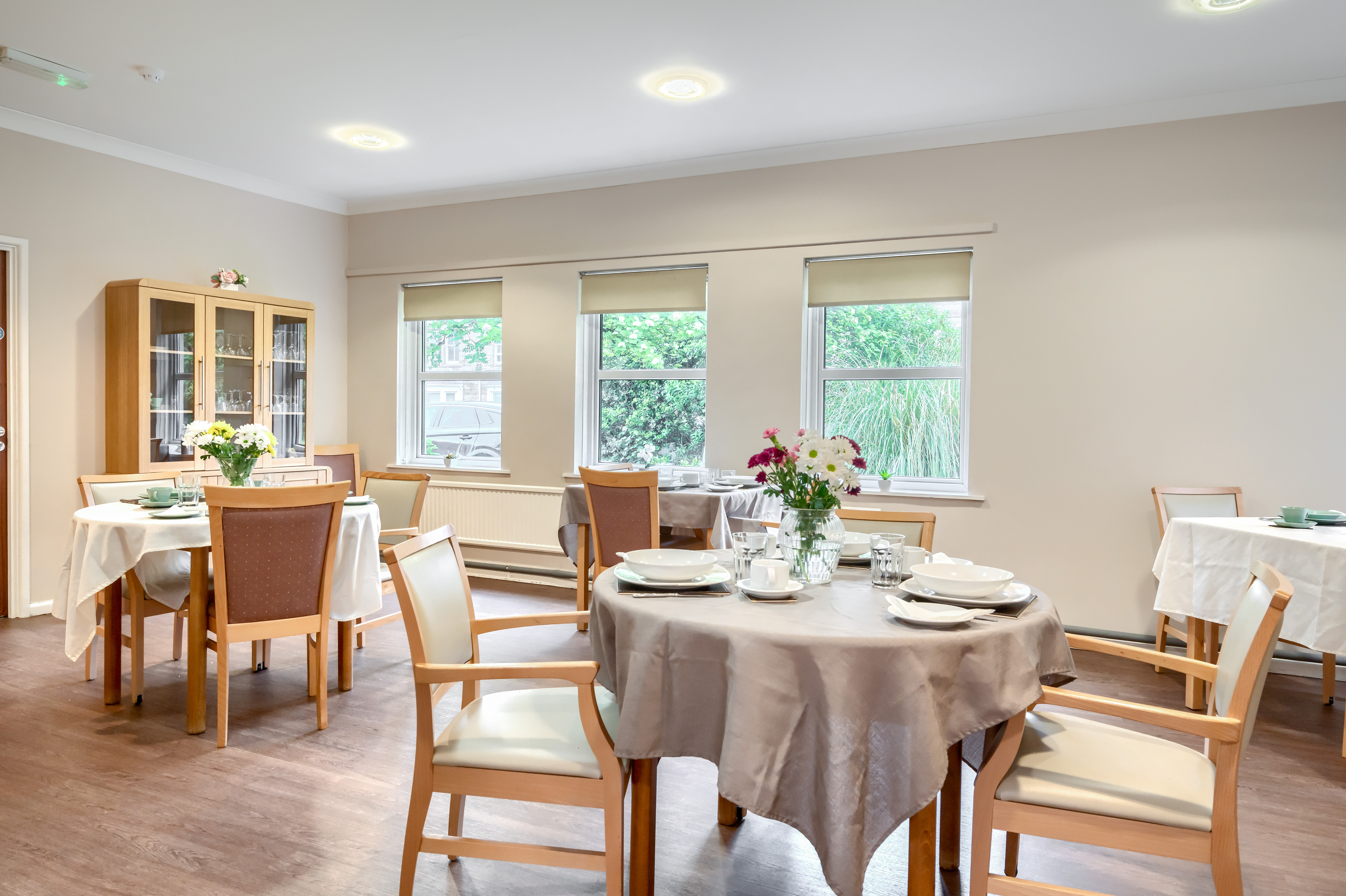 communal-dining-room-set-for-lunch-at Abbeyfield House, Cockermouth CA13 9RH (1)