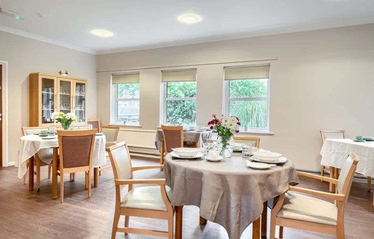 communal-dining-room-set-for-lunch-at Abbeyfield House, Cockermouth CA13 9RH (1)